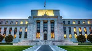 المركزي الأمريكي يخفف شراء السندات ويرفض رفع أسعار الفائدة