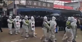على الهواء.. منتهكو قواعد كورونا في الصين يتعرضون لعقوبات صارمة (فيديو)