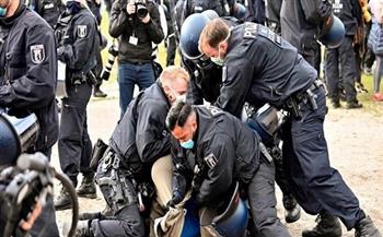 الشرطة البلجيكية تحتجز 132 شخصا خلال مظاهرة تعترض على قيود كورونا