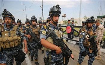 الداخلية العراقية تعتقل 3 اشخاص بينهم امرأة تحمل كلاشينكوف