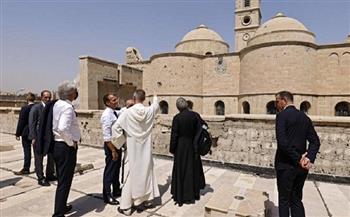 الرئيس الفرنسي يزور كنيسة "سيدة الساعة" بالموصل العراقية 