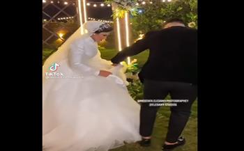 رد فعل صادم لعروسة مصرية وجدت "صرصارا" في فستان الزفاف (فيديو)