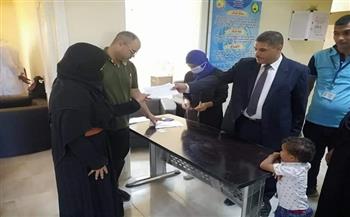 توزيع 700 فيزا كارت على أسر الشهداء في قرية الروضة بـ«شمال سيناء»