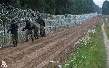 حرس الحدود البيلاروسي يحبط محاولة طرد مهاجرين من جانب لاتفيا باتجاه بيلاروس