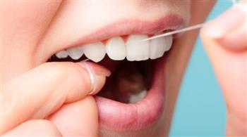 خيط الأسنان يجنبك التهاب اللثة