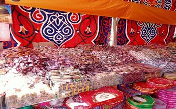 عادة تاريخية.. أسعار حلوى المولد والعرائس في السيدة زينب (صور)