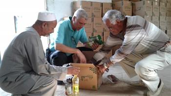 توزيع 1200 كرتونة مواد غذائية على أهالي مرسى علم