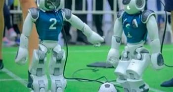 تزاحم نجوم المستطيل الأخضر.. روبوتات تلعب كرة القدم بمهارة عالية (فيديو)