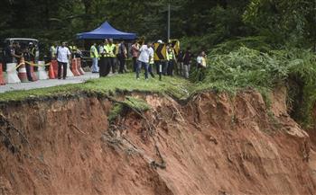 ارتفاع عدد ضحايا الانهيار الأرضي في ماليزيا إلى 21 قتيلا
