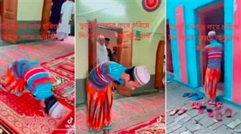 شاب مبتور الساق والذراعين يحرص على الصلاة بالمسجد (فيديو)
