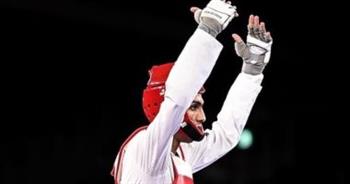 «الأولمبية» تهنئ سيف عيسى بصدارة التصنيف العالمي للتايكوندو 