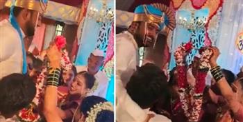 لسبب لا يصدق.. هندي يتزوج أختين توأم في نفس الليلة «فيديو»