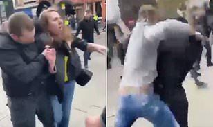 أول فيديو لضرب سيدة وسحلها وسط الشارع بسبب مباراة (فيديو) 