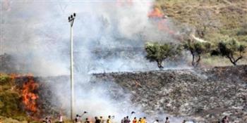 مستوطنون يحرقون أراضي زراعية ويهاجمون منازل جنوب نابلس