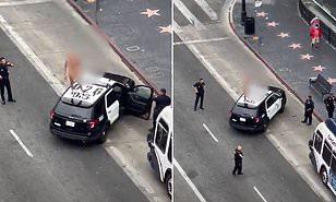 في مشهد غريب | رجل يرقص "عاريا" فوق سيارة شرطة بأمريكا .. فيديو 