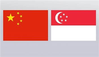 وزيرا خارجية الصين وسنغافورة يناقشان العلاقات والتعاون