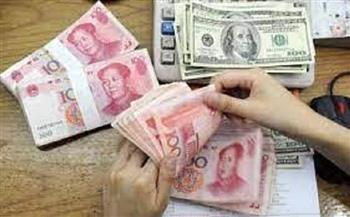 الصين تحدد سعر الدولار أمام اليوان عند 6.7467