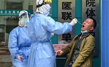 الصين تسجل 614 إصابة جديدة بفيروس كورونا