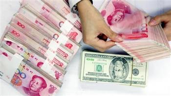 الصين تحدد سعر الدولار أمام اليوان عند 6.8388