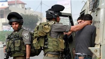اعتقال 15 فلسطينيا بالضفة الغربية