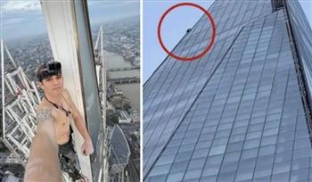 كارثة في انتظاره .. شاب متهور يتسلق أطول ناطحة سحاب في بريطانيا (صور)