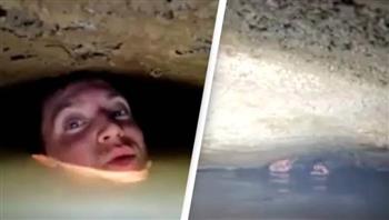 مغامر يُصاب بنوبة ذعر داخل كهف مغمور بالمياه(فيديو)