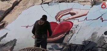 فنانان سوريان يرسمان بفرشاة الأمل على حطام الزلزال في جنديرس (فيديو)