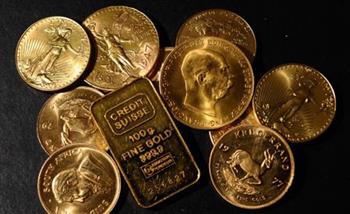الذهب يتراجع 0.3 بالمئة من أعلى مستوياته في عام