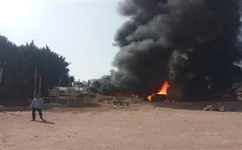 السيطرة على حريق بجراج سيارات نقل الوقود أسفل كوبري مدينة قها (صور)