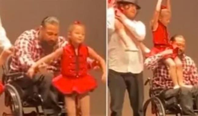 من فوق كرسي متحرك.. وصلة رقص مبهرة بين أب وطفلته (فيديو)