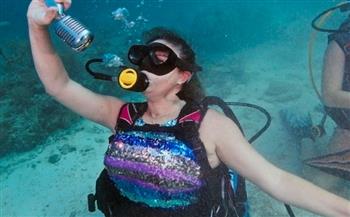 حفل موسيقي تحت الماء للدعوة إلى حماية الشعاب المرجانية