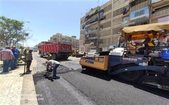 استمرار أعمال وضع الأسفلت و ورصف شارع النصر ببورسعيد  
