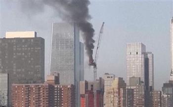 انهيار رافعة عملاقة وسط نيويورك واشتعال النيران فيها