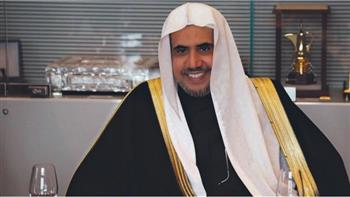 عبد الكريم العيسى يمنح مفتي الجمهورية العضوية الشرفية في رابطة الجامعات الإسلامية  