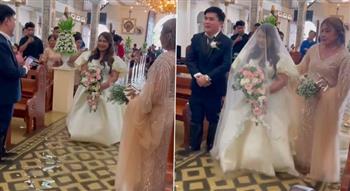 بالفيديو.. عروسان يقيمان حفل زفافهما داخل كنيسة غمرتها مياه الإعصار