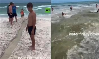 حفر قناة رمل.. لعبة طفولية تتسبب في كارثة على شاطئ فلوريدا (فيديو)