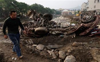 الصين تُكافح لاحتواء دمار الإعصار.. جسور منهارة وشوارع غارقة بالمياه