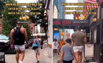 عملاق أمريكي يسير في الشارع .. كيف ظهر المارة بجانبه؟ (فيديو)