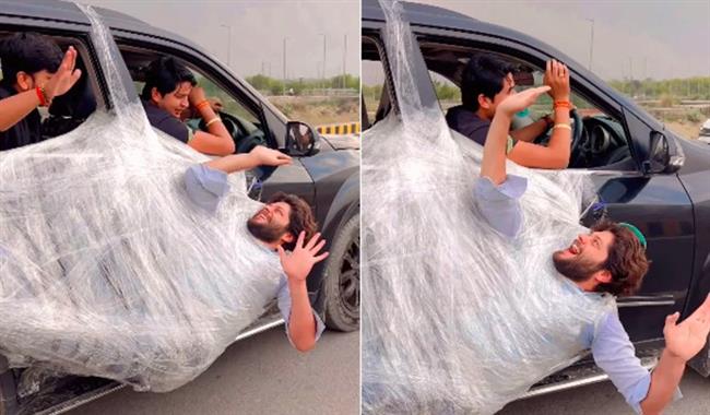 فيديو.. رجل يتدلى في كيس بلاستيك من باب سيارة متحركة يشعل الإنترنت