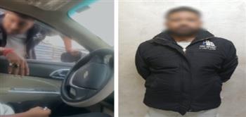 ضبط منادي سيارات تعدى سبًا على قائد سيارة في الجيزة