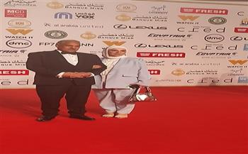 محمد رضوان على السجادة الحمراء برفقة زوجته في مهرجان القاهرة السينمائي
