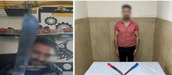 القبض على شخص يحمل أسلحة بيضاء وبندقية صيد لتهديد آخر بالجيزة