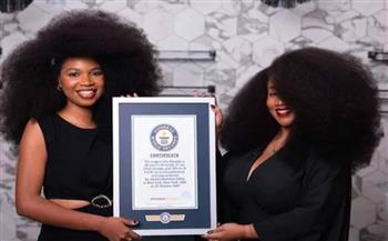 شاهد.. أمريكية تدخل موسوعة جينيس بأكبر شعر طبيعي