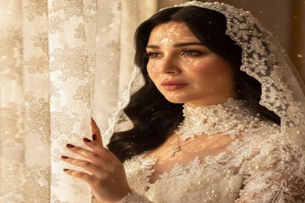 مي عز الدين تشارك جمهورها صورًا بفستان الزفاف على إنستجرام