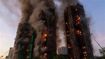 ارتفاع عدد ضحايا الحريق في المبنى السكني بهونج كونج إلى 128 قتيلا