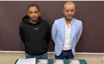 القبض على شخصين يوزعان كروت دعاية وأموال على الناخبين بالمعصرة