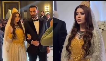 زفاف أثار الجدل.. عروس لا يمكنها الحركة بسبب ثقل الذهب الذي ترتديه (فيديو)
