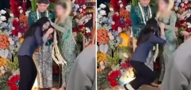 حاولت تقبيل زوجها.. عروس تؤّدب ضرّتها في حفل زفافها (فيديو)