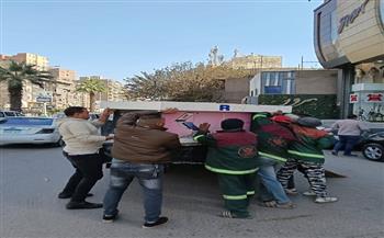 محافظة الجيزة تشن حملة مكبرة على المقاهي والمحال المتعدية على حرم الطريق العام بشارع فيصل 