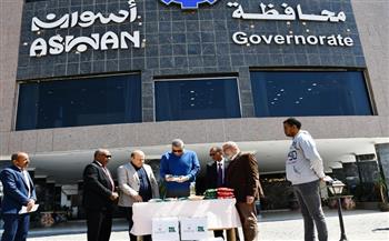 أسوان: قافلة رمضانية مهداة من البنك الزراعي بواقع ألف كرتونة مواد غذائية
